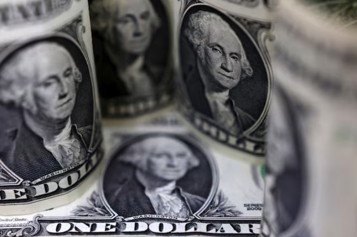 Dollar Hit 7-Month Low Before Powell